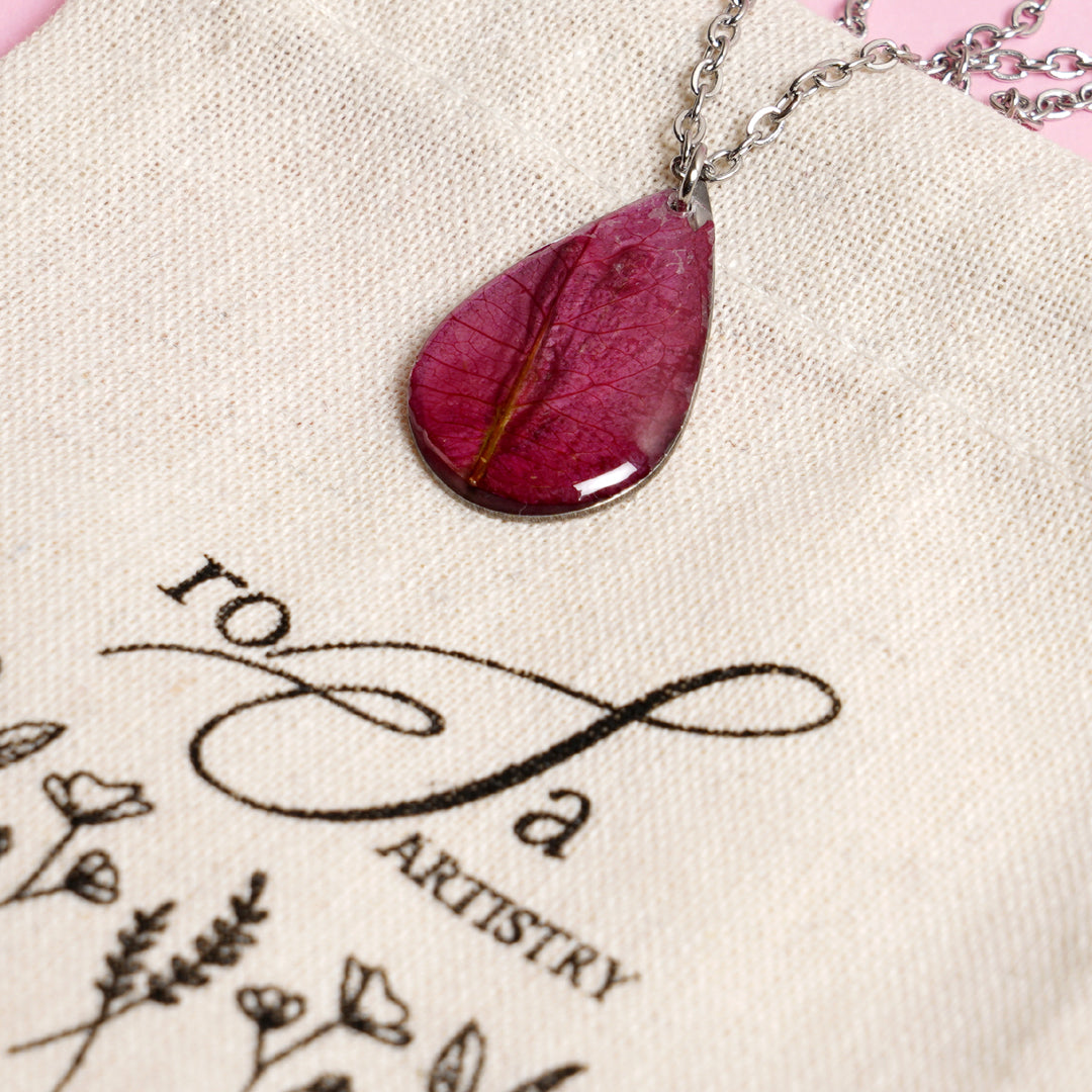 “Petals of Perseverance” – Pink Bougainvillea Resin Pendant