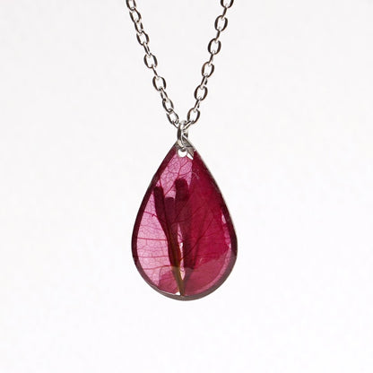 “Petals of Perseverance” – Pink Bougainvillea Resin Pendant