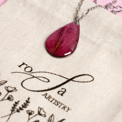 “Petals of Perseverance” – Pink Bougainvillea Resin Pendant