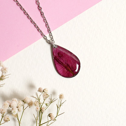 “Petals of Perseverance” – Pink Bougainvillea Resin Pendant
