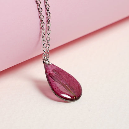“Petals of Perseverance” – Pink Bougainvillea Resin Pendant